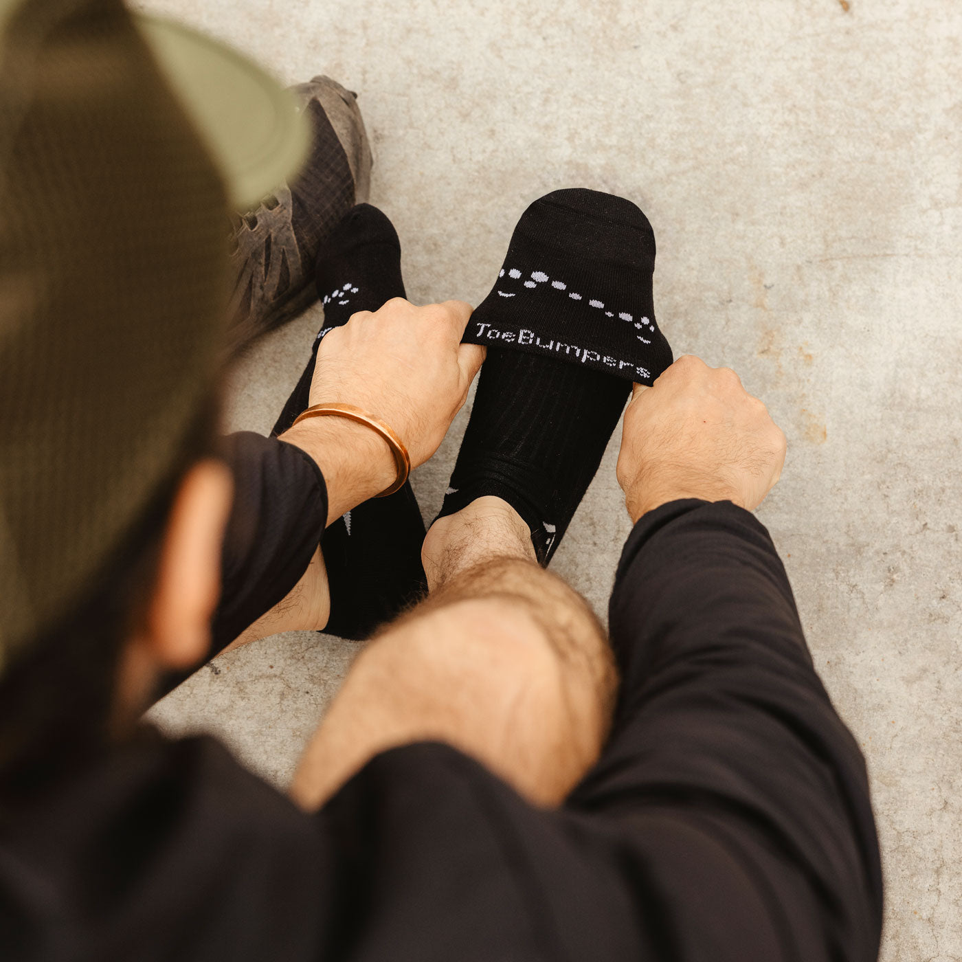 Toe Bumpers toe padding socks designed to protect toes from impact inside running shoes